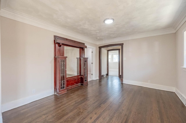 150 S 13th Ave, Maywood, IL 60153 - spare room featuring dark wood-type flooring, baseboards, and crown molding