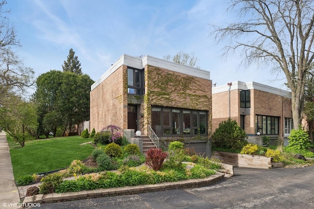 2751 Prairie Ave, Evanston, IL 60201 - view of building exterior with an attached garage