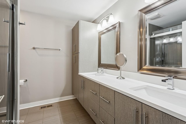 2751 Prairie Ave, Evanston, IL 60201 - full bath with double vanity and baseboards