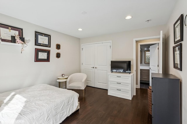 2751 Prairie Ave, Evanston, IL 60201 - bedroom featuring dark wood-style floors, recessed lighting, and a closet