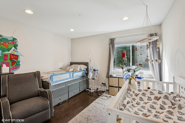 2751 Prairie Ave, Evanston, IL 60201 - bedroom with wood finished floors and recessed lighting