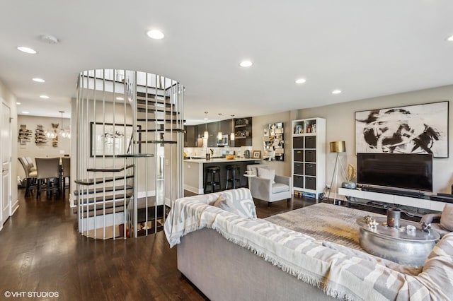 2751 Prairie Ave, Evanston, IL 60201 - living room with recessed lighting, dark wood finished floors, and baseboards