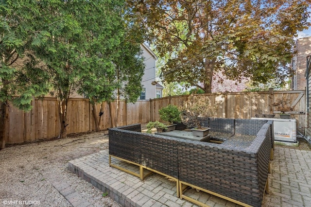 2751 Prairie Ave, Evanston, IL 60201 - fenced backyard featuring a patio and an outdoor hangout area