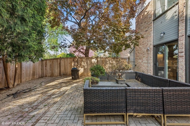 2751 Prairie Ave, Evanston, IL 60201 - fenced backyard with an outdoor living space and a patio