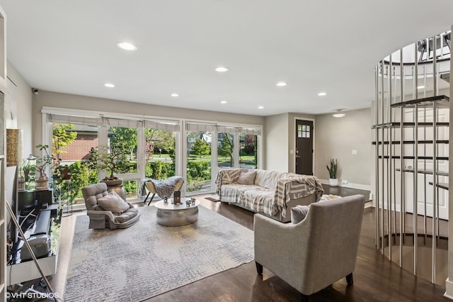 2751 Prairie Ave, Evanston, IL 60201 - living room featuring healthy amount of natural light, recessed lighting, dark wood-type flooring, and baseboards