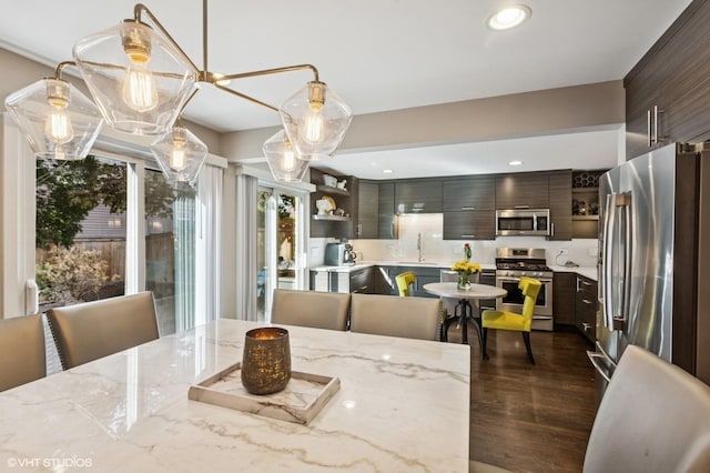 2751 Prairie Ave, Evanston, IL 60201 - dining space featuring dark wood finished floors and recessed lighting