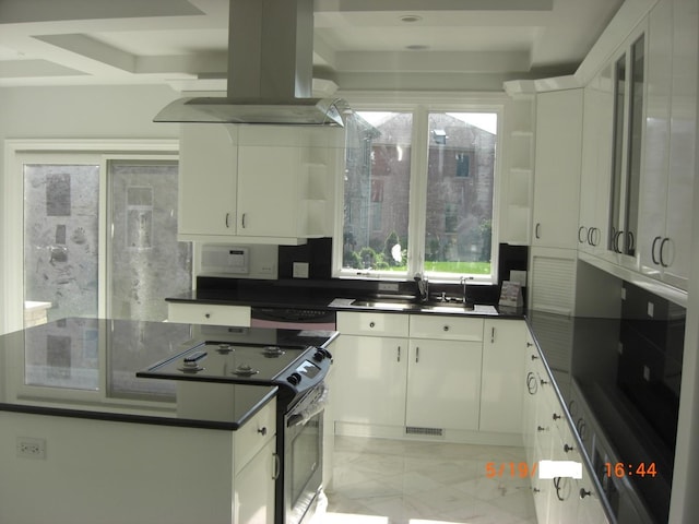kitchen with range with electric stovetop, a sink, dark countertops, island exhaust hood, and healthy amount of natural light