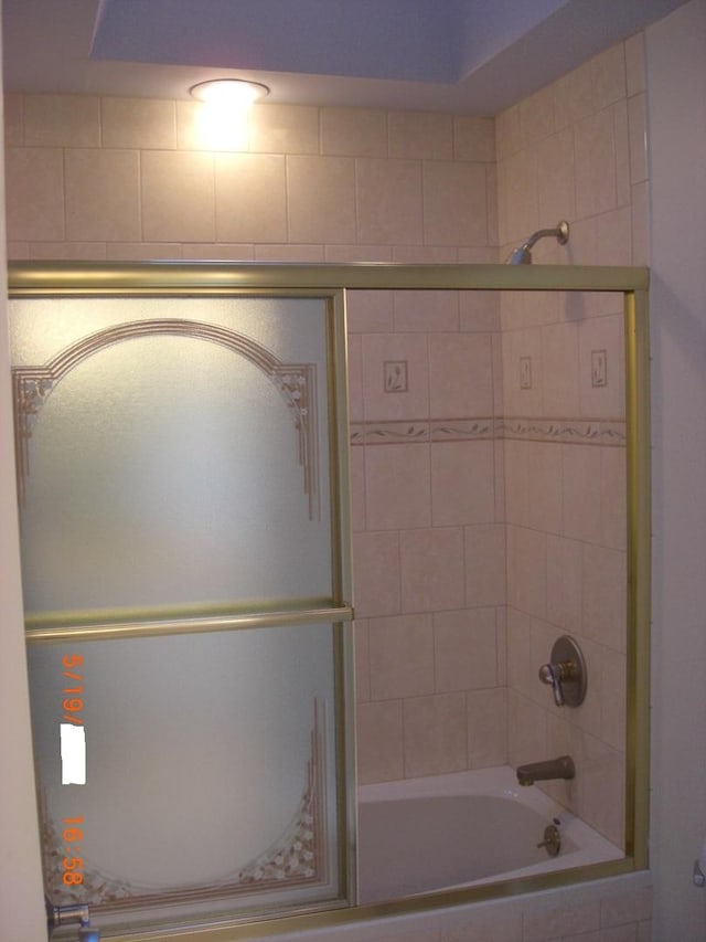 full bathroom featuring tiled shower / bath