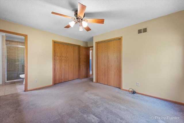 118 Centralia Pl, Poplar Grove, IL 61065 - unfurnished bedroom with carpet flooring, baseboards, ensuite bath, multiple closets, and ceiling fan