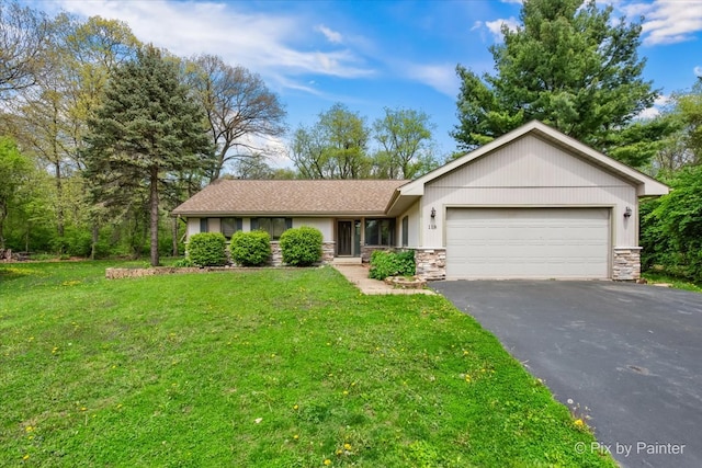118 Centralia Pl, Poplar Grove, IL 61065 - single story home featuring stone siding, asphalt driveway, an attached garage, and a front yard