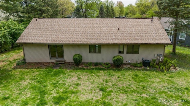 118 Centralia Pl, Poplar Grove, IL 61065 - back of property with a yard, a shingled roof, and central AC unit