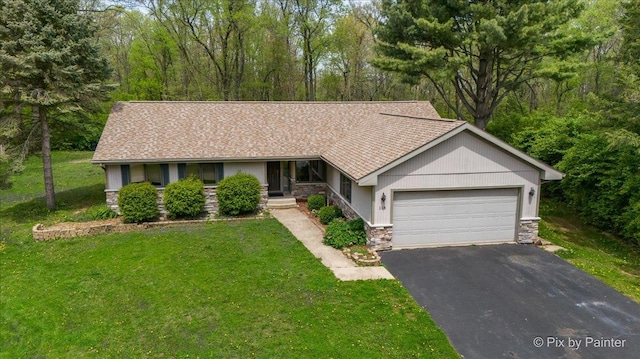 118 Centralia Pl, Poplar Grove, IL 61065 - ranch-style house featuring stone siding, an attached garage, asphalt driveway, and a front lawn
