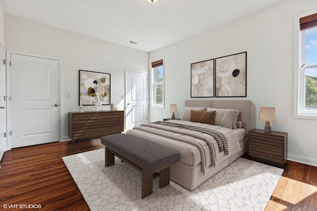 4727 N Clark St Unit 2S, Chicago, IL 60640 - bedroom with wood finished floors and baseboards
