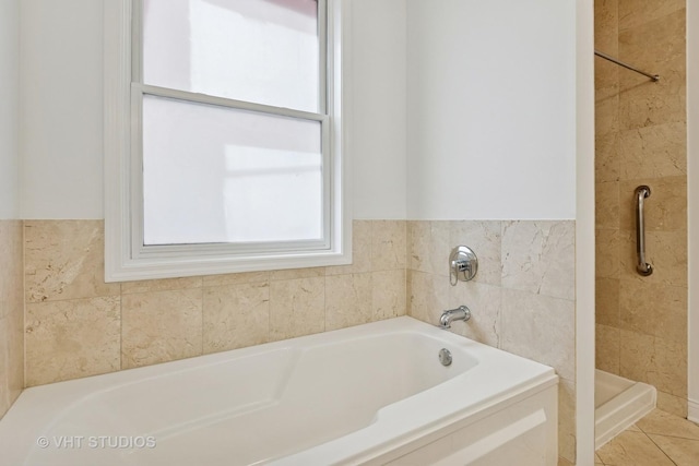 4727 N Clark St Unit 2S, Chicago, IL 60640 - bathroom featuring a garden tub and a shower stall