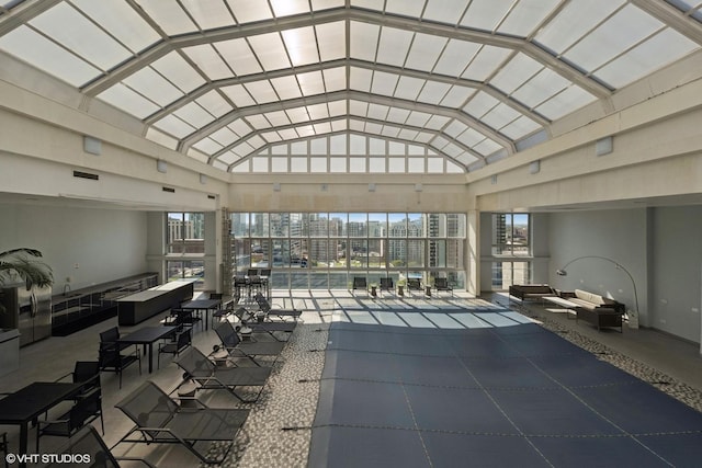 view of pool with an outdoor hangout area, a view of city, and a patio area