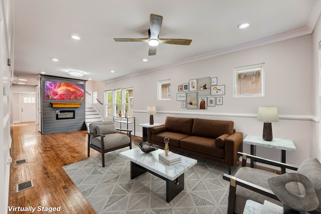 11311 S Stewart Ave, Chicago, IL 60628 - living area with ornamental molding, ceiling fan, recessed lighting, wood finished floors, and baseboards