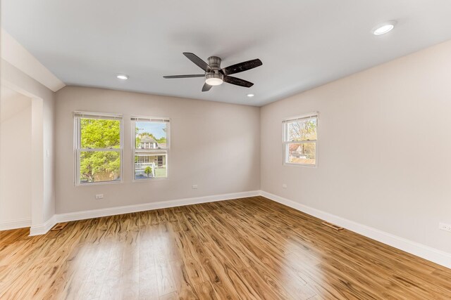 11311 S Stewart Ave, Chicago, IL 60628 - unfurnished room featuring light wood finished floors, baseboards, ceiling fan, and recessed lighting
