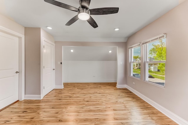 11311 S Stewart Ave, Chicago, IL 60628 - spare room with light wood finished floors, baseboards, recessed lighting, and a ceiling fan