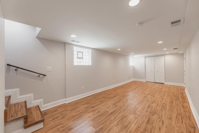 11311 S Stewart Ave, Chicago, IL 60628 - below grade area with light wood-style floors, baseboards, and recessed lighting
