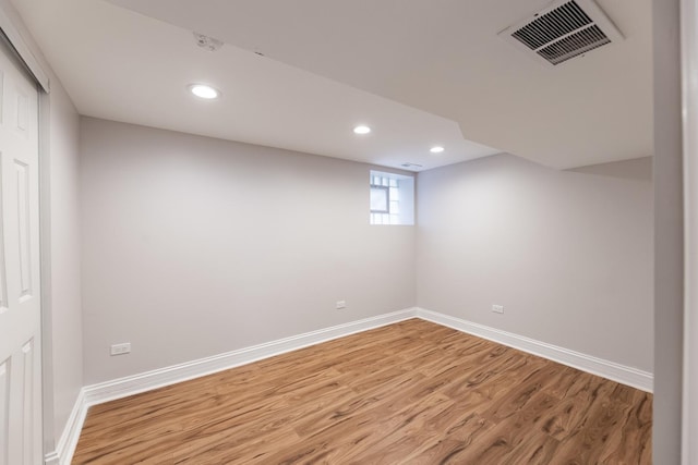 11311 S Stewart Ave, Chicago, IL 60628 - basement featuring light wood-style floors, baseboards, and recessed lighting