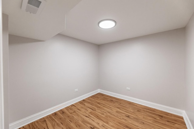 11311 S Stewart Ave, Chicago, IL 60628 - unfurnished room with light wood-style flooring and baseboards