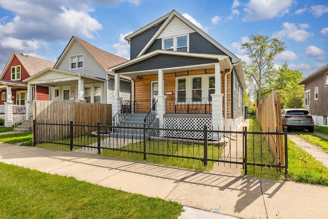 11311 S Stewart Ave, Chicago, IL 60628 - view of front of house with a porch and a gate