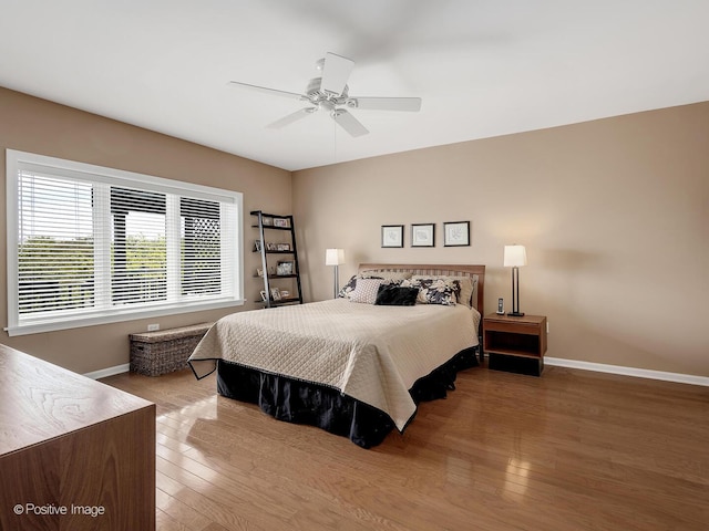 131 W Adelaide St Unit 308, Elmhurst, IL 60126 - bedroom with baseboards, wood finished floors, and ceiling fan