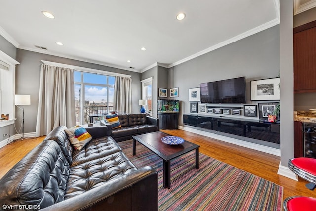 2451 S Western Ave Unit 3N, Chicago, IL 60608 - living room with crown molding, wood finished floors, recessed lighting, and baseboards