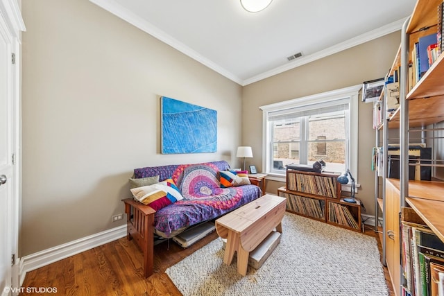 2451 S Western Ave Unit 3N, Chicago, IL 60608 - living area with crown molding, wood finished floors, and baseboards