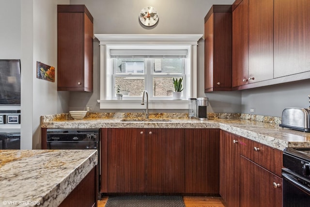 2451 S Western Ave Unit 3N, Chicago, IL 60608 - kitchen with a sink, black appliances, and light stone countertops