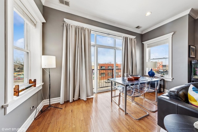 2451 S Western Ave Unit 3N, Chicago, IL 60608 - dining room featuring ornamental molding, light wood-style floors, baseboards, and recessed lighting
