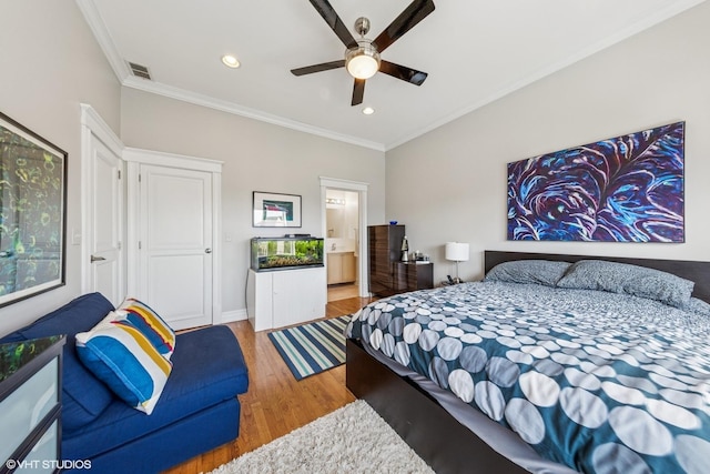 2451 S Western Ave Unit 3N, Chicago, IL 60608 - bedroom featuring wood finished floors, recessed lighting, ornamental molding, baseboards, and a ceiling fan