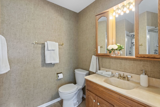 283 E Fabish Dr, Buffalo Grove, IL 60089 - bathroom featuring vanity, toilet, and tiled shower