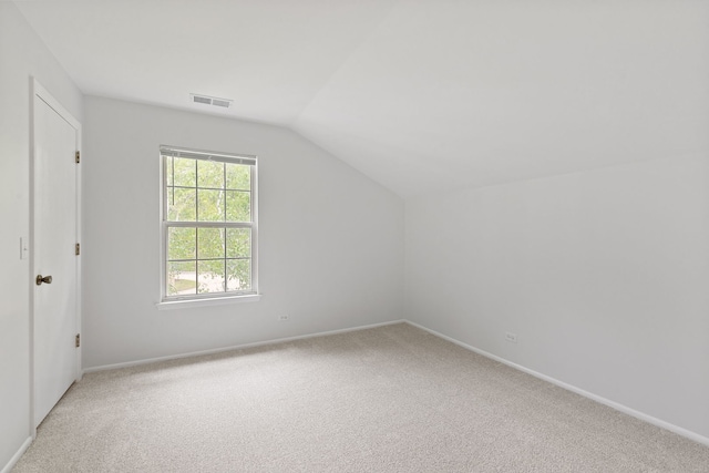 283 E Fabish Dr, Buffalo Grove, IL 60089 - bonus room featuring lofted ceiling, carpet floors, and baseboards