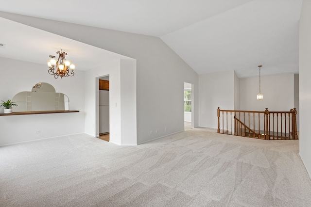 283 E Fabish Dr, Buffalo Grove, IL 60089 - carpeted empty room with a chandelier, lofted ceiling, and baseboards