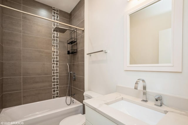 full bath with vanity, toilet, and  shower combination