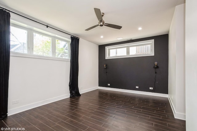 empty room featuring baseboards, dark wood finished floors, recessed lighting, and ceiling fan
