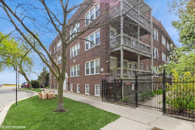 1225 W Jarvis Ave Unit 3, Chicago, IL 60626 - view of apartment building / complex featuring fence