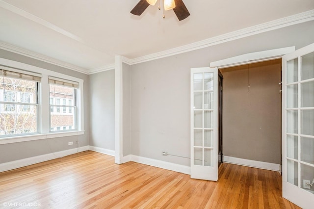 1225 W Jarvis Ave Unit 3, Chicago, IL 60626 - unfurnished room featuring wood finished floors, baseboards, crown molding, and a ceiling fan