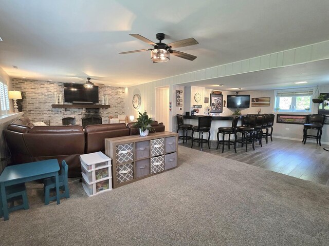 574 Aberdeen Rd, Frankfort, IL 60423 - living area with bar area, a ceiling fan, and wood finished floors