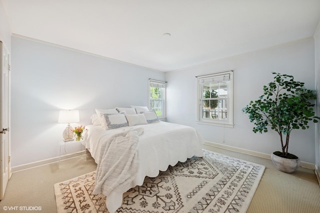 836 E Glenwood Rd, Glenview, IL 60025 - carpeted bedroom with baseboards and crown molding