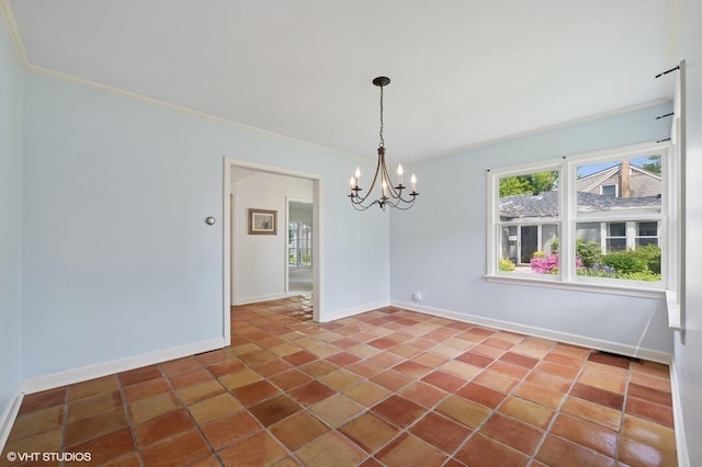 836 E Glenwood Rd, Glenview, IL 60025 - unfurnished room with a chandelier, baseboards, dark tile patterned floors, and ornamental molding
