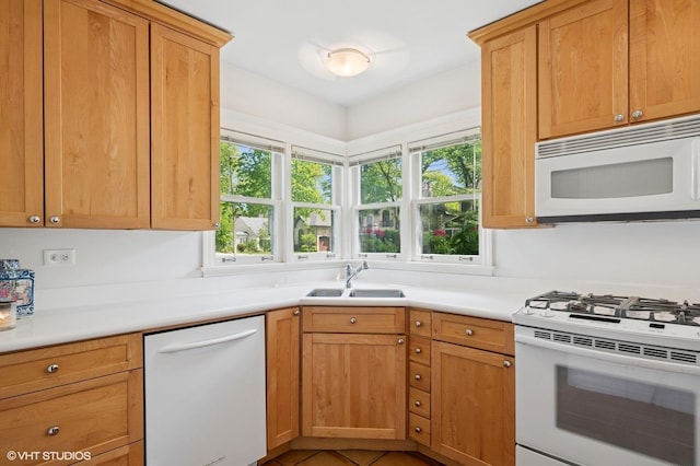 836 E Glenwood Rd, Glenview, IL 60025 - kitchen featuring white appliances, a sink, and light countertops