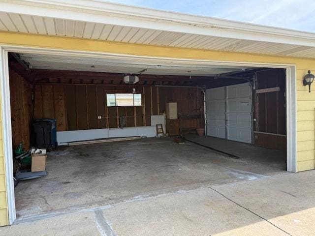 772 Memorial Dr, Calumet City, IL 60409 - garage with a garage door opener and wooden walls