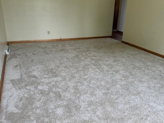 772 Memorial Dr, Calumet City, IL 60409 - carpeted empty room featuring baseboards