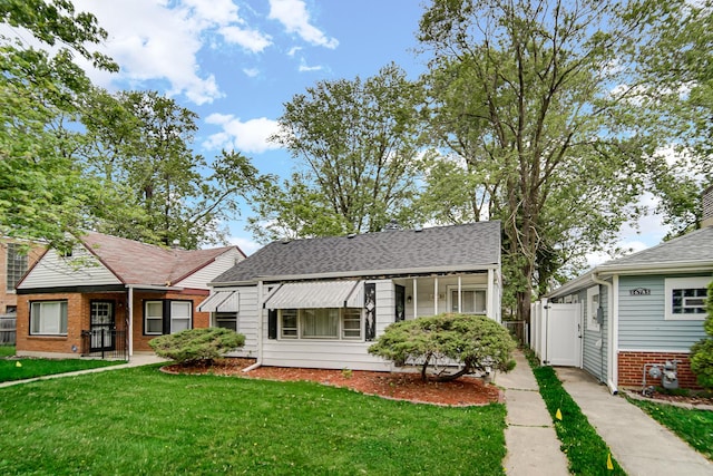 16781 Head St, Hazel Crest, IL 60429 - view of front of property with a shingled roof and brick siding