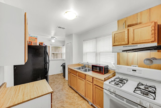 16781 Head St, Hazel Crest, IL 60429 - kitchen with black appliances, under cabinet range hood, a sink, and ceiling fan