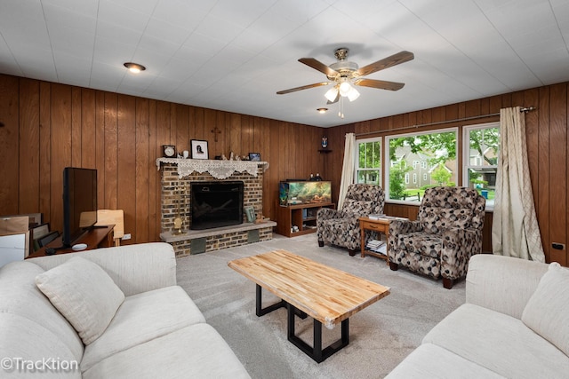 4929 Washington St, Downers Grove, IL 60515 - living room with ceiling fan, carpet flooring, wood walls, and a brick fireplace