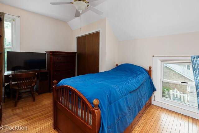 4929 Washington St, Downers Grove, IL 60515 - bedroom featuring hardwood / wood-style floors, vaulted ceiling, and a ceiling fan