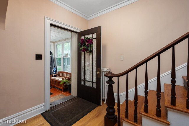 4929 Washington St, Downers Grove, IL 60515 - entryway featuring wood finished floors, ornamental molding, and stairway